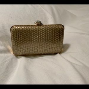 Dull gold evening bag/clutch with crystal top.looks like diamonds are al…